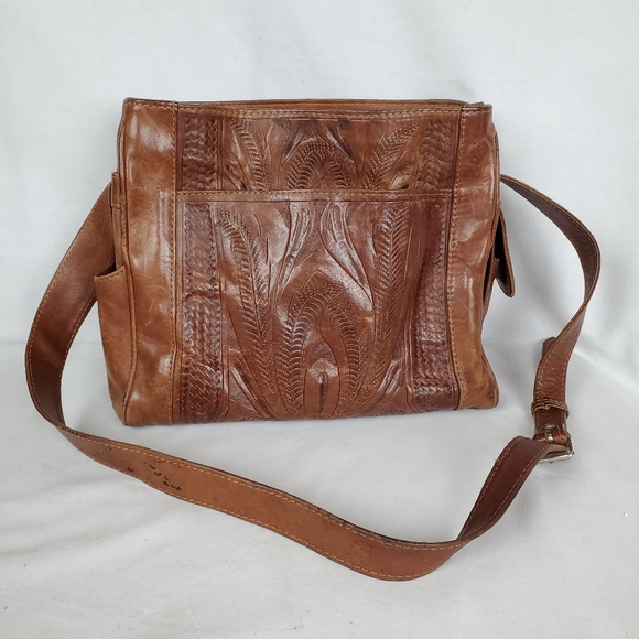 Boutique hand tooled Leather handbag adjustable